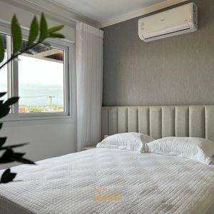 Apartamento com 69m², 2 dormitórios, 1 suíte, 1 vaga no Residencial Acrópole em Torres para Comprar