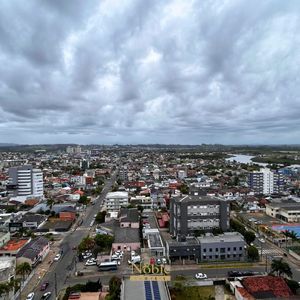 Apartamento com 70m², 2 dormitórios, 1 suíte, 1 vaga no Monet em Torres para Comprar