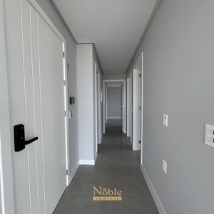 Apartamento com 102m², 3 dormitórios, 1 suíte, 2 vagas no Maui Residencial em Torres para Comprar