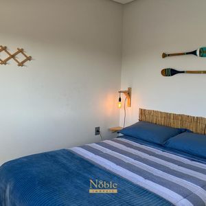 Apartamento com 74m², 2 dormitórios, 1 suíte, 2 vagas no Essenza em Torres para Comprar