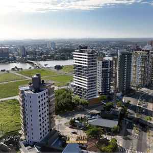 Apartamento com 73m², 2 dormitórios, 1 suíte, 1 vaga no Residencial New em Torres para Comprar