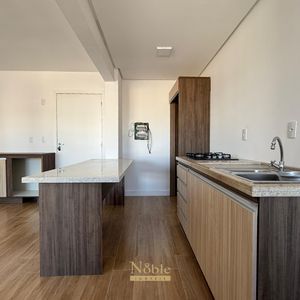 Apartamento com 80m², 2 dormitórios, 1 suíte, 1 vaga no Trade Center em Torres para Comprar