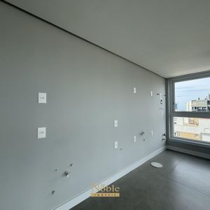 Apartamento com 102m², 3 dormitórios, 1 suíte, 2 vagas no Maui Residencial em Torres para Comprar