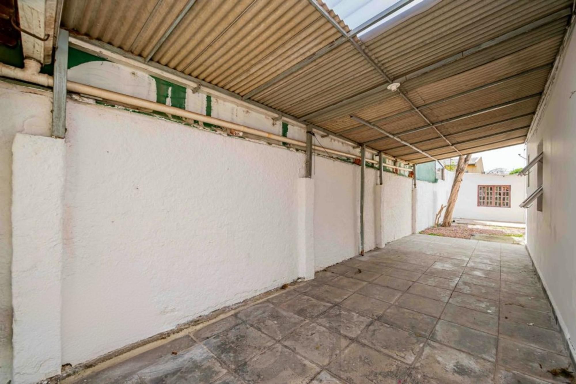 Casa de 2 dormitórios, churrasqueira, pátio, 4 vagas no bairro Ipanema — foto 31