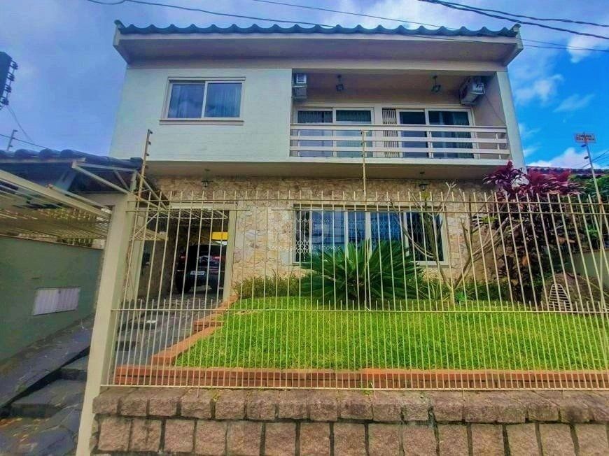 Excelente casa com 3 dormitórios e 3 vagas de garagem — foto 2