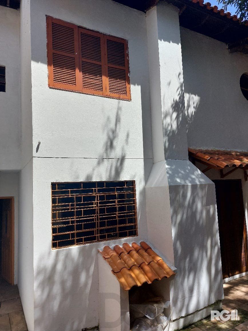 Casa com 3 dormitórios, sendo 1 suíte, 3 vagas, no bairro Nonoai, Porto Alegre, RS — foto 68
