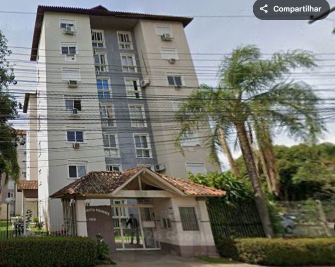 Apartamento 2 dormitórios com 1 vaga, prédio com elevador no Bairro Cristal — foto 1