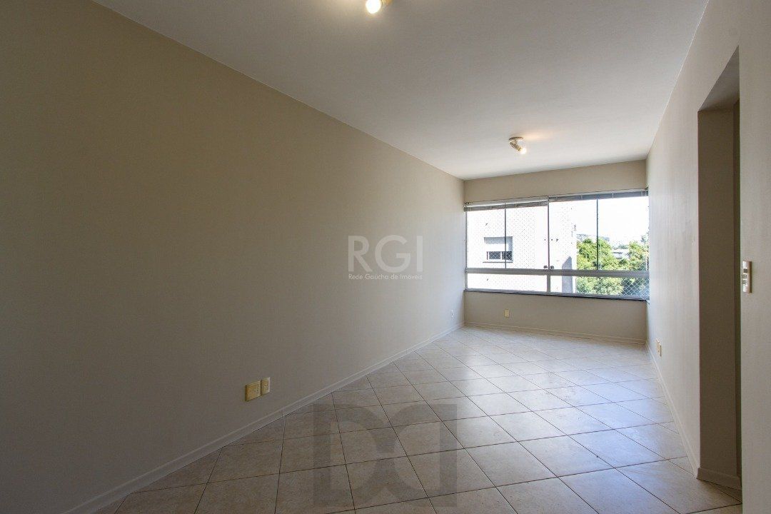 APARTAMENTO DE 3 DORMITÓRIOS EM CONDOMÍNIO FECHADO NA CAVALHADA — foto 2