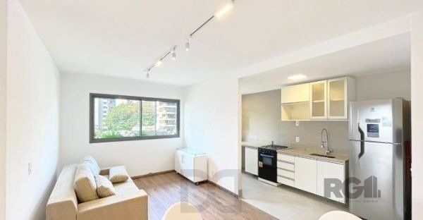 Apartamento no bairro Auxiliadora de 2 dormitórios vaga e infra DESOCUPADO — foto 2