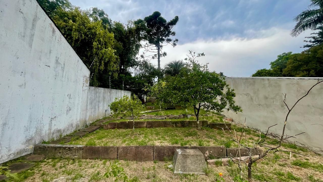 Terreno em área nobre com casa averbada e árvores frutíferas — foto 5