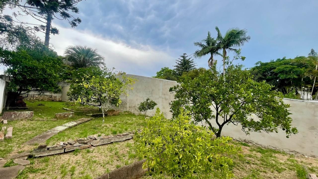 Terreno em área nobre com casa averbada e árvores frutíferas — foto 6