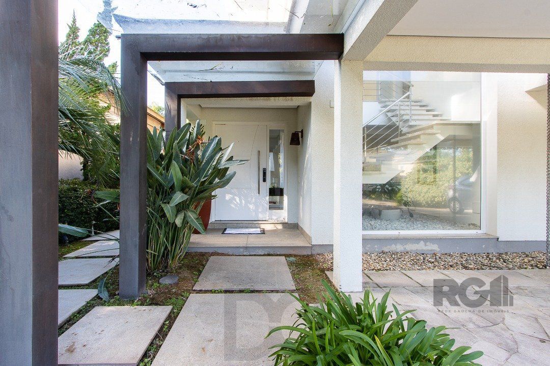 Casa no Condomínio Las Rocas, vista para o Guaíba, com 5 suítes — foto 4