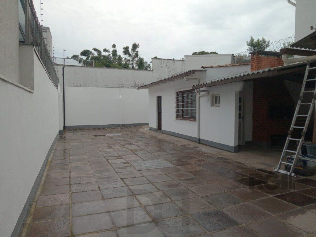 Sobrado no bairro Higienópolis de 3 dormitórios e 3 vagas — foto 35