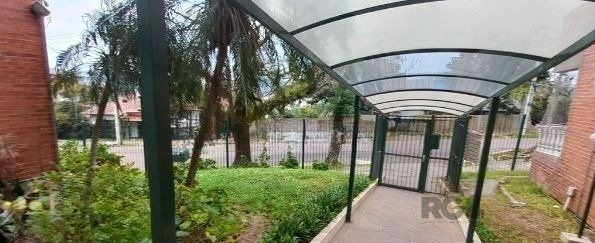 Apartamento de 2 dormitórios no bairro Teresópolis térreo com pátio DESOCUPADO — foto 17