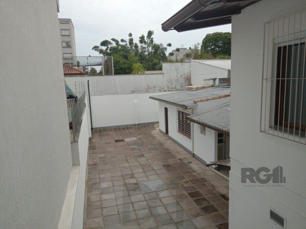 Sobrado no bairro Higienópolis de 3 dormitórios e 3 vagas — foto 28
