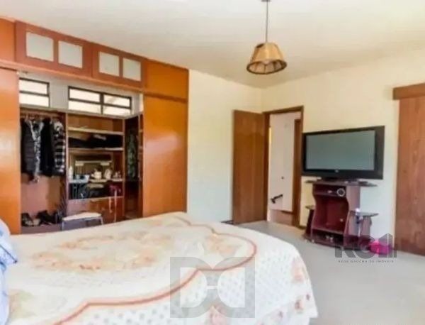 Casa sobrado no bairro Tristeza de 4 dormitórios 3 vagas DESOCUPADA — foto 10