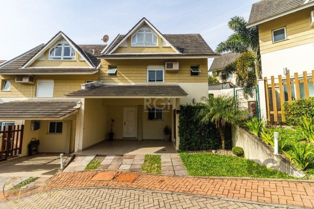 Casa de Condomínio à venda com 3 quartos, 208m², 1 suíte, 2 vagas, Avenida Engenheiro Ludolfo Boehl no bairro Teresópolis em Porto Alegre