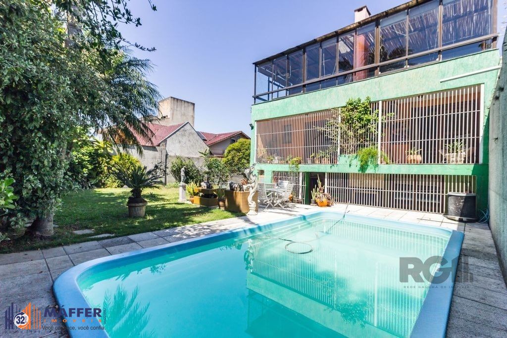 Casa 470m² - 4 dormitórios, 5 vagas no bairro Jardim São Pedro