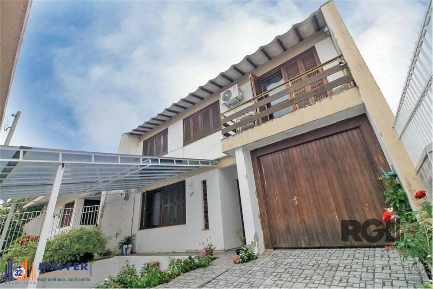 Casa de 285m² - 4 dormitórios, 4 vagas no bairro Bom Jesus