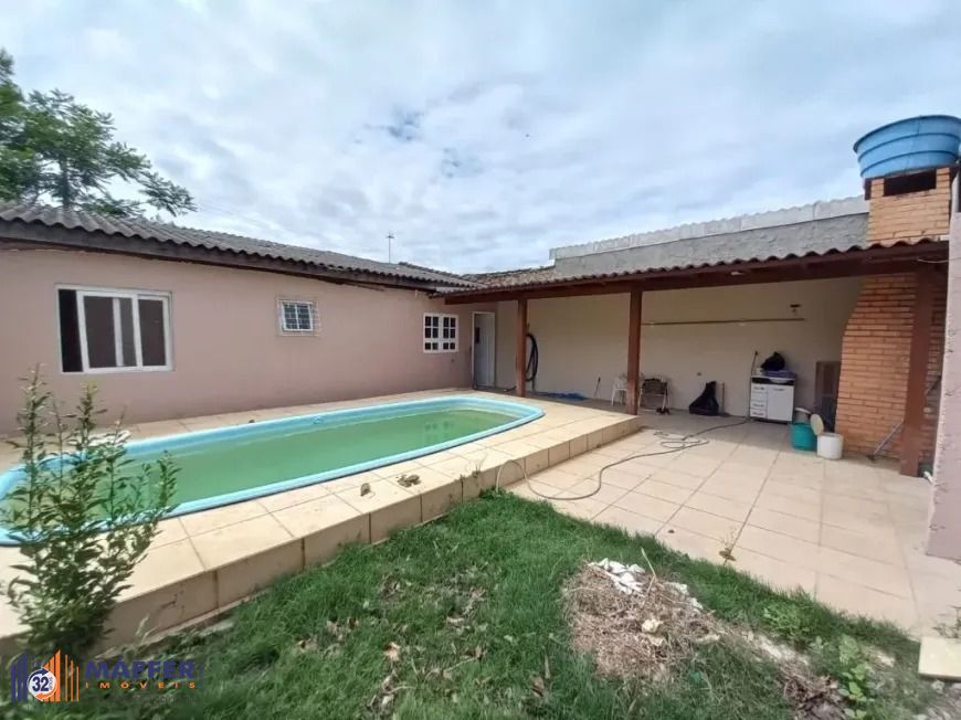 Casa de alvenaria com pátio, piscina Igui e churrasqueira no Parque dos Eucaliptos em Gravataí/RS