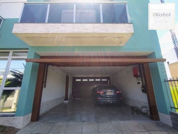 Casa em Porto Alegre, no bairro Hípica, com 3 dormitório(s), e 3 banheiros, à venda. — foto 3