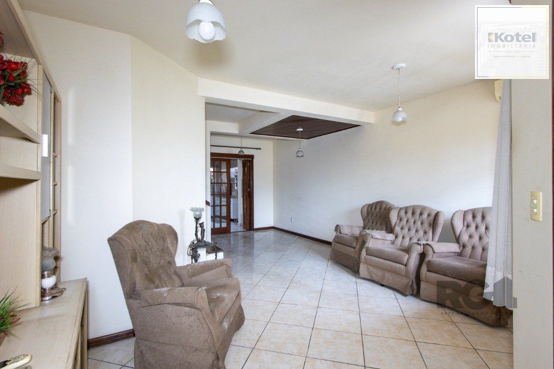 Casa em Condomínio na Zona Sul, no bairro Hípica, com 2 dormitórios, living para dois ambientes, cozinha mobiliada, lavabo — foto 5
