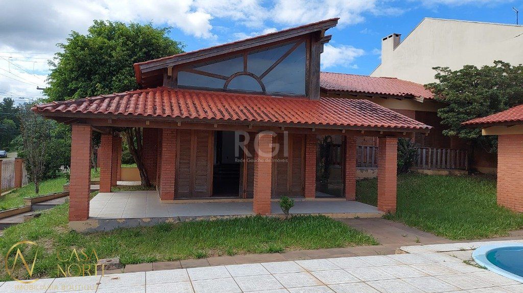 Casa à venda com 3 quartos, 302m², 1 suíte, 2 vagas, Rua Kyve T. Knijnik no bairro Espírito Santo em Porto Alegre