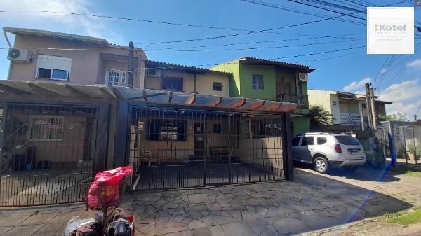 Casa em Porto Alegre, no bairro Hípica, com 3 dormitório(s), à venda. — foto 2