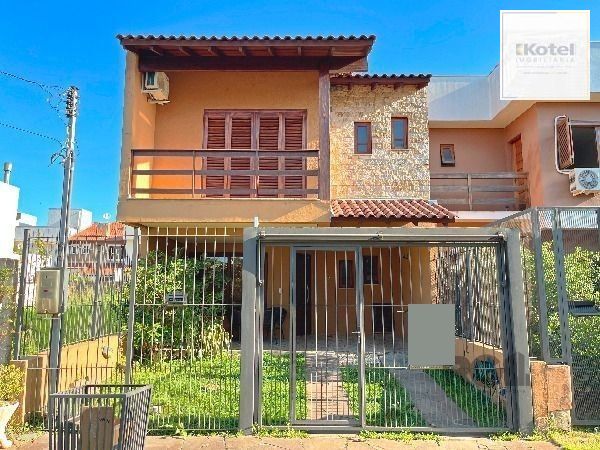 Casa em Porto Alegre, no bairro Hípica, com 3 dormitório(s), e 3 banheiros, à venda. — foto 2