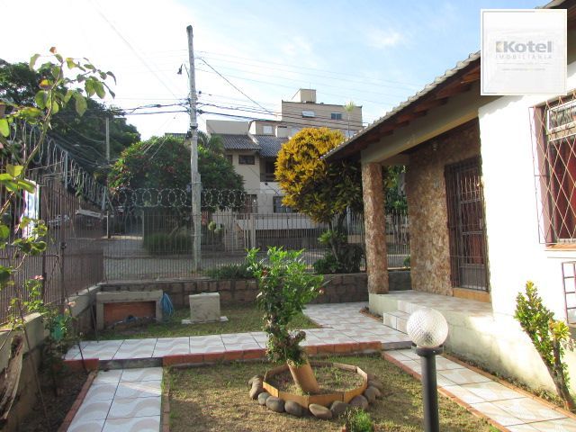 Casa térrea, com 3 dormitórios, 1 suíte, no bairro Nonoai. — foto 4