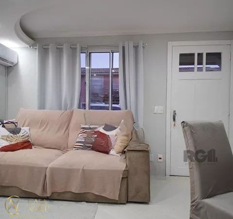 Casa de Condomínio à venda com 3 quartos, 71m², 1 vaga, Avenida Faria Lobato no bairro Sarandi em Porto Alegre