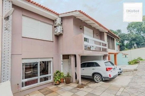 Casa em condomínio no bairro Santo Antônio de 4 dormitórios e 2 vagas