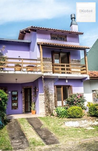 Casa em condomínio fechado de 2 quartos, suíte, 2 vagas no bairro Guarujá — foto 2