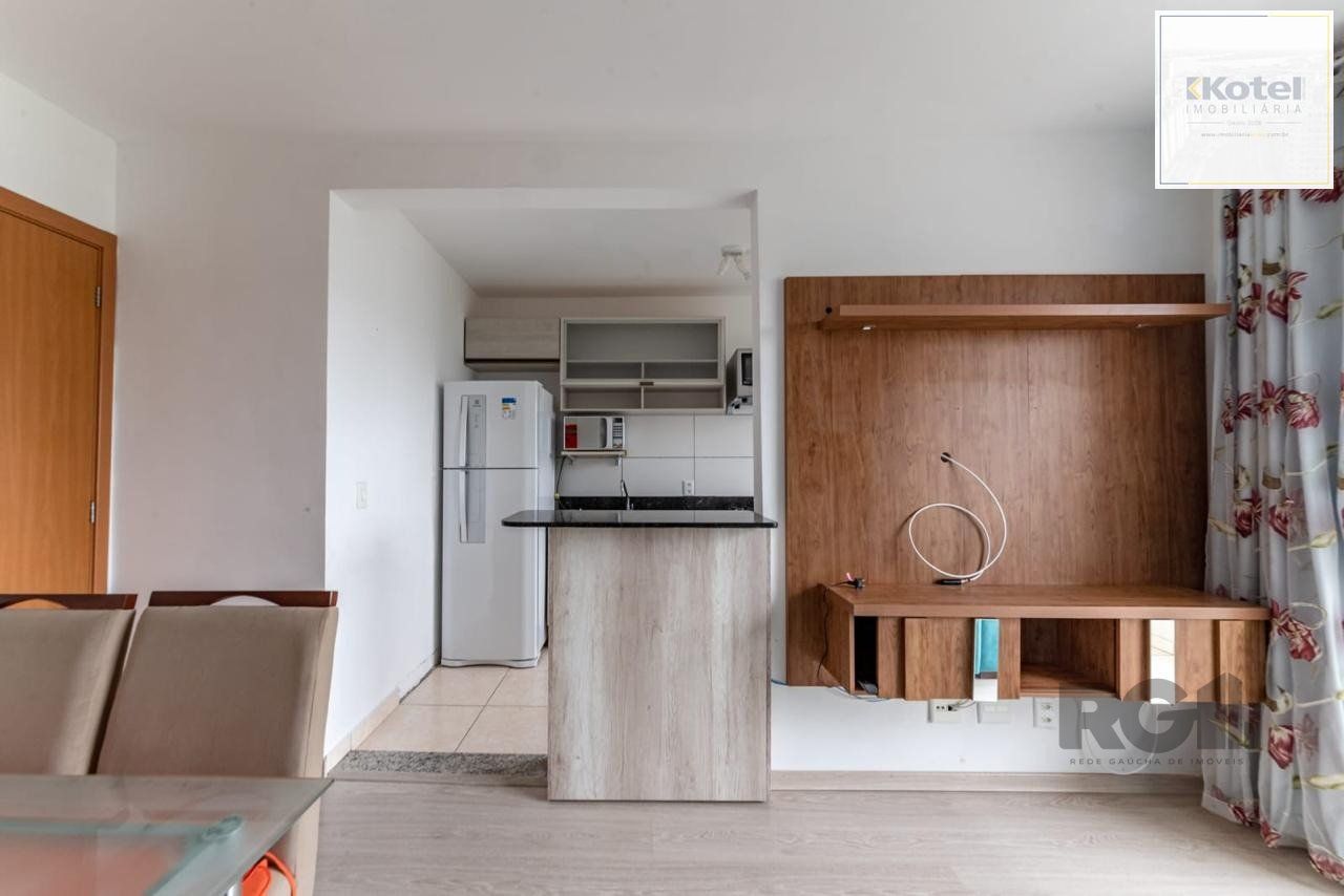 Apartamento 2 dormitórios e uma vaga no bairro morro santana com sacada. — foto 3