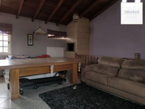 Casa em Porto Alegre, no bairro Hípica, com 3 dormitório(s), e 3 banheiros, à venda. — foto 4
