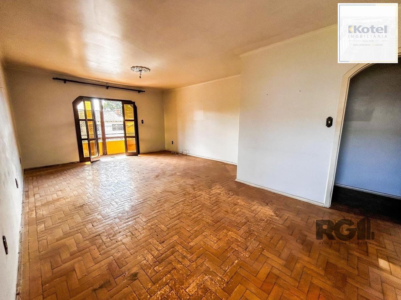 Casa com 2 salas comerciais, 3 quartos, vaga de garagem churrasqueira, suíte, no bairro Cavalhada, Porto Alegre/RS — foto 3