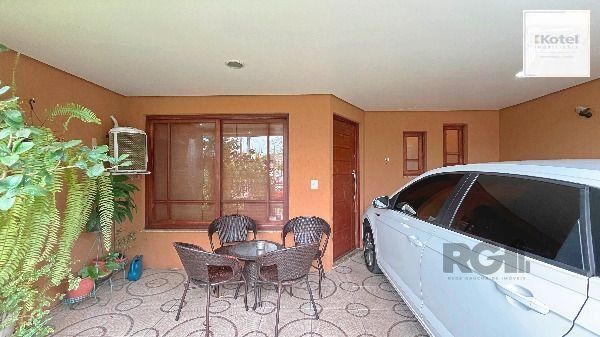 Casa em Porto Alegre, no bairro Hípica, com 3 dormitório(s), e 3 banheiros, à venda. — foto 3