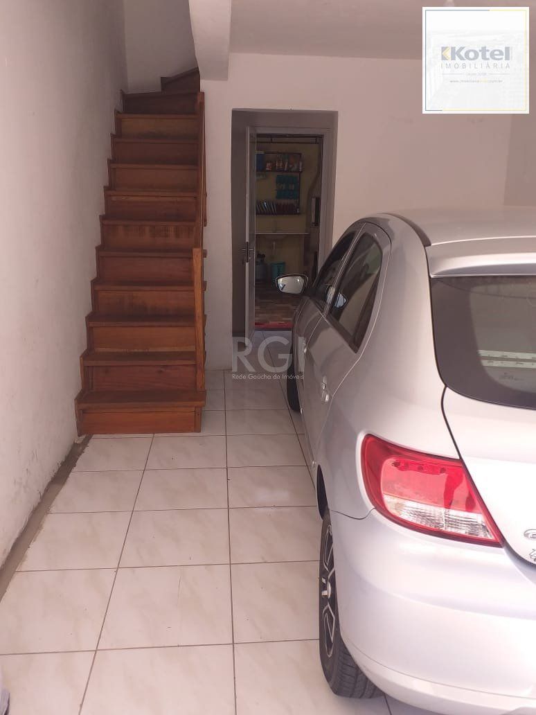 Casa com 2 quartos, banheiro, área de serviço, cozinha, vaga de garagem, no bairro Aberta dos Morros/RS — foto 2