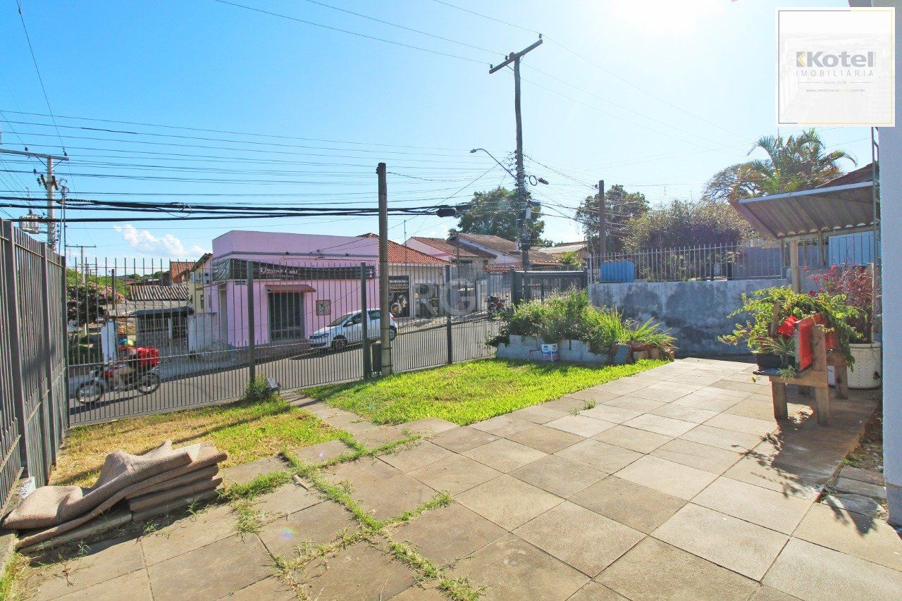 Casa 5 dormitórios, 1 suíte, 2 vagas de garagem, no bairro Camaquã, Poa/RS. — foto 4