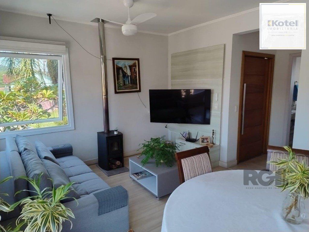 Casa de 3 dormitórios no bairro Mário Quintana — foto 2