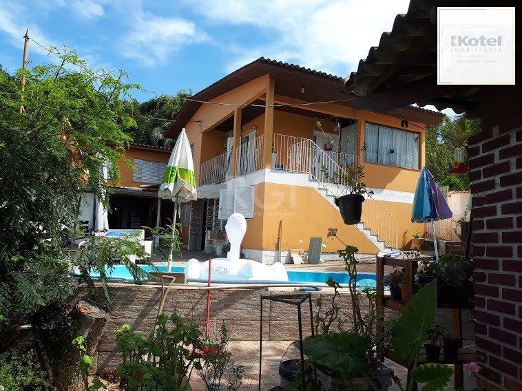 Casa com 4 dormitórios no bairro Vila Nova — foto 2