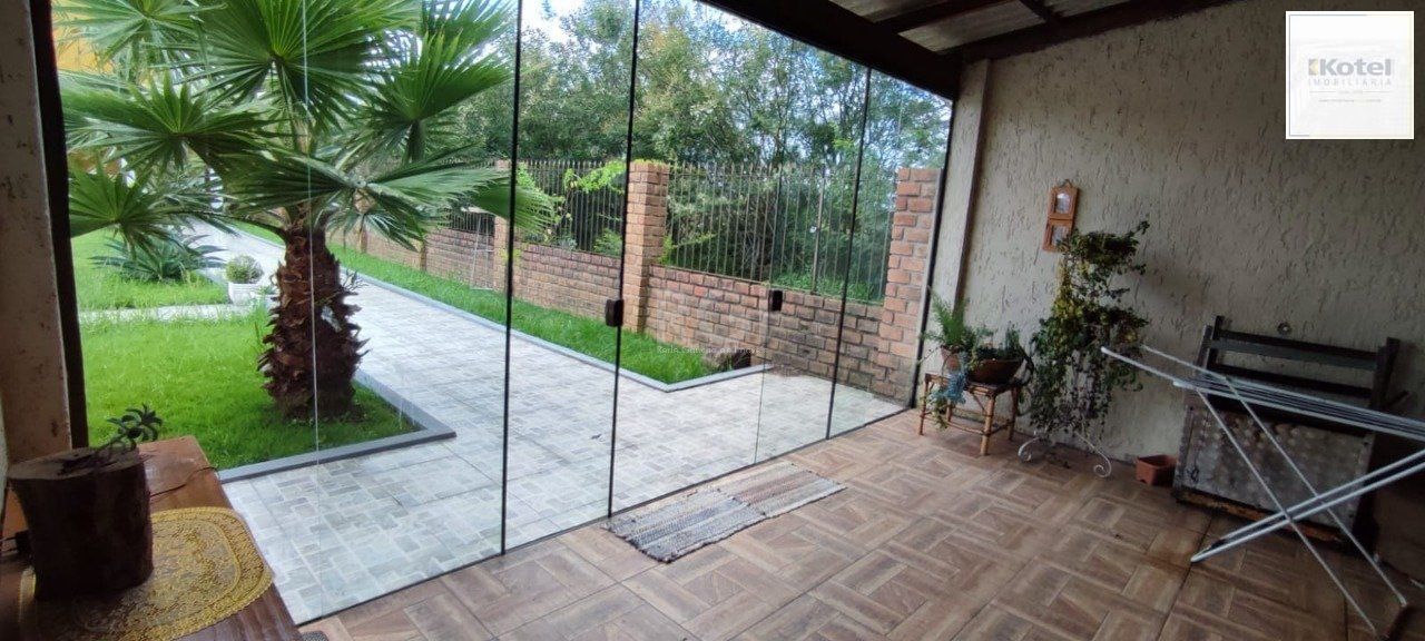 Casa com Piscina no bairro Lami — foto 5