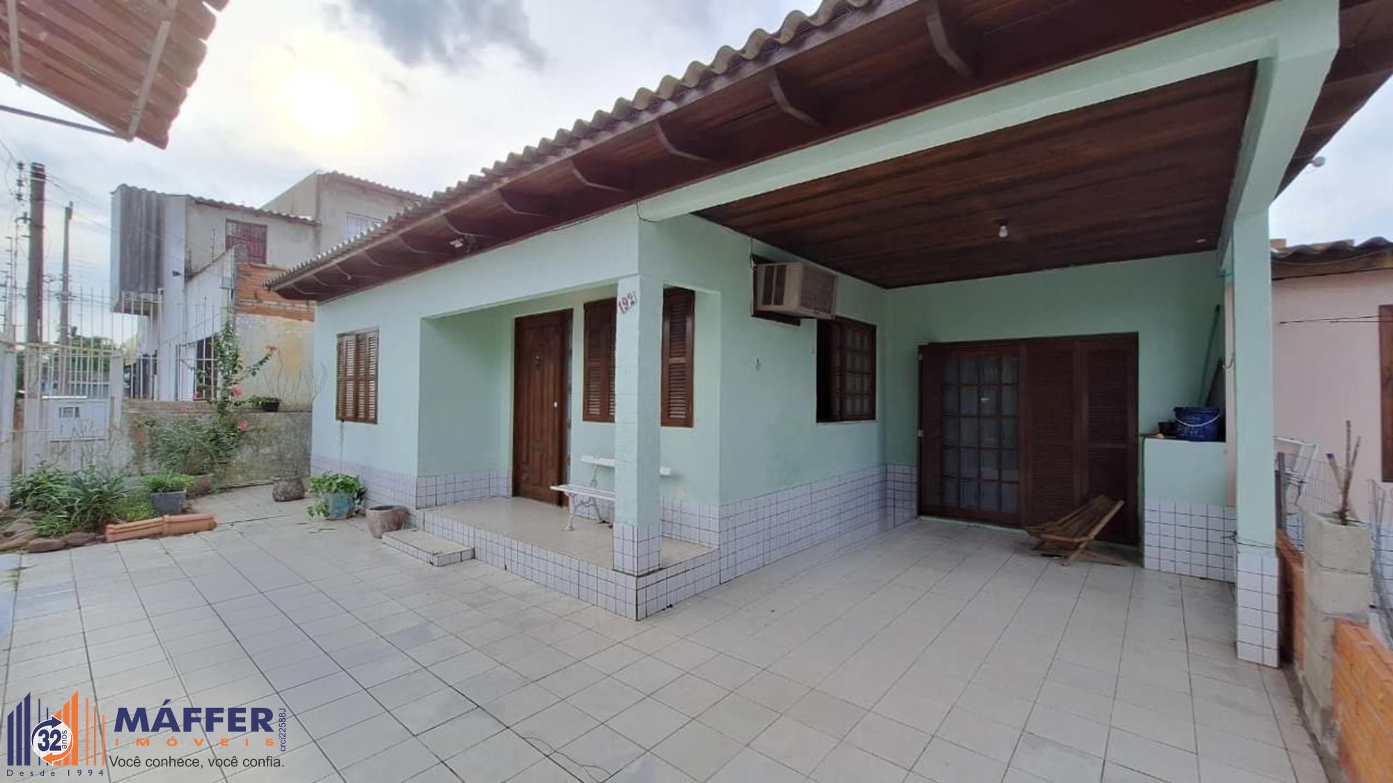 Casa de 4 dormitórios e 4 vagas de garagem em Canoas.
