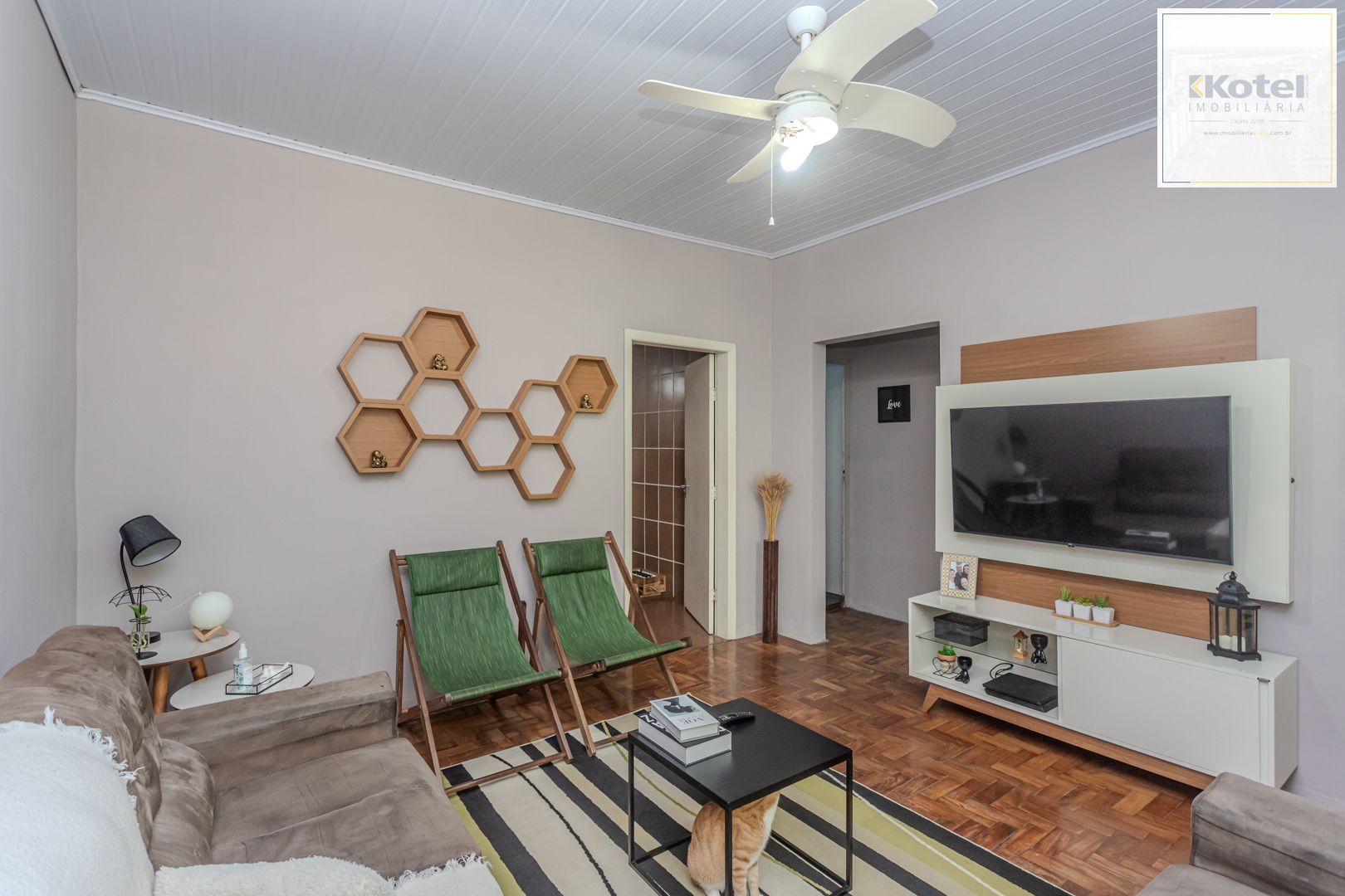Casa no bairro Jardim Botânico de 3 dormitórios e garagem e terreno com 370m² — foto 3