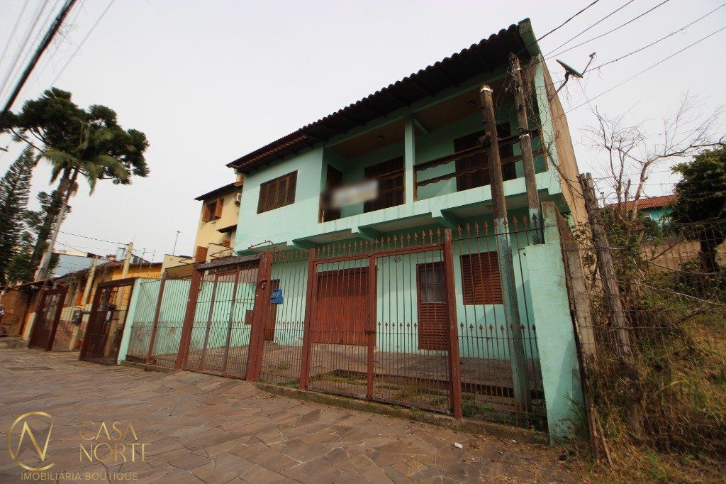 Casa à venda com 3 quartos, 262m², 1 suíte, 2 vagas, Rua Guadalajara no bairro Jardim Sabará em Porto Alegre