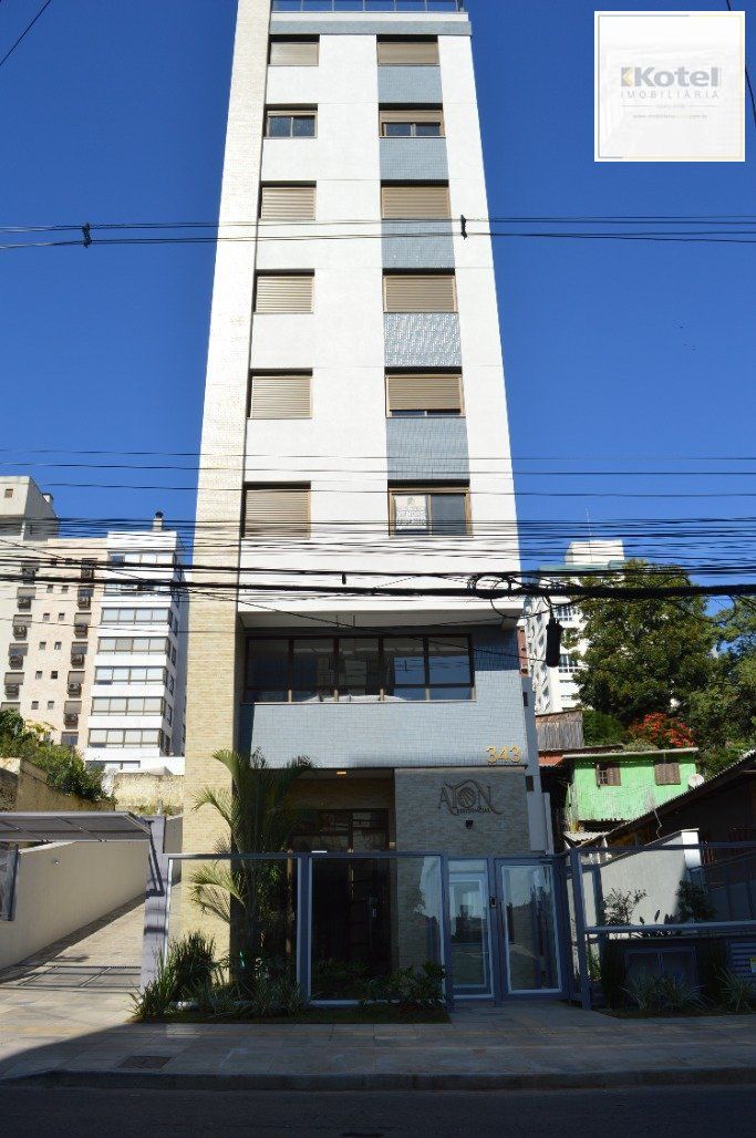 Lindo apartamento 2 dormitórios com 2 suítes, lavabo, vaga de garagem, amplo living 2 ambientes e cozinha com churrasqueira. — foto 2