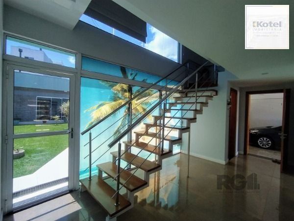 Casa em Porto Alegre, no bairro Hípica, com 3 dormitório(s), e 3 banheiros, à venda. — foto 4