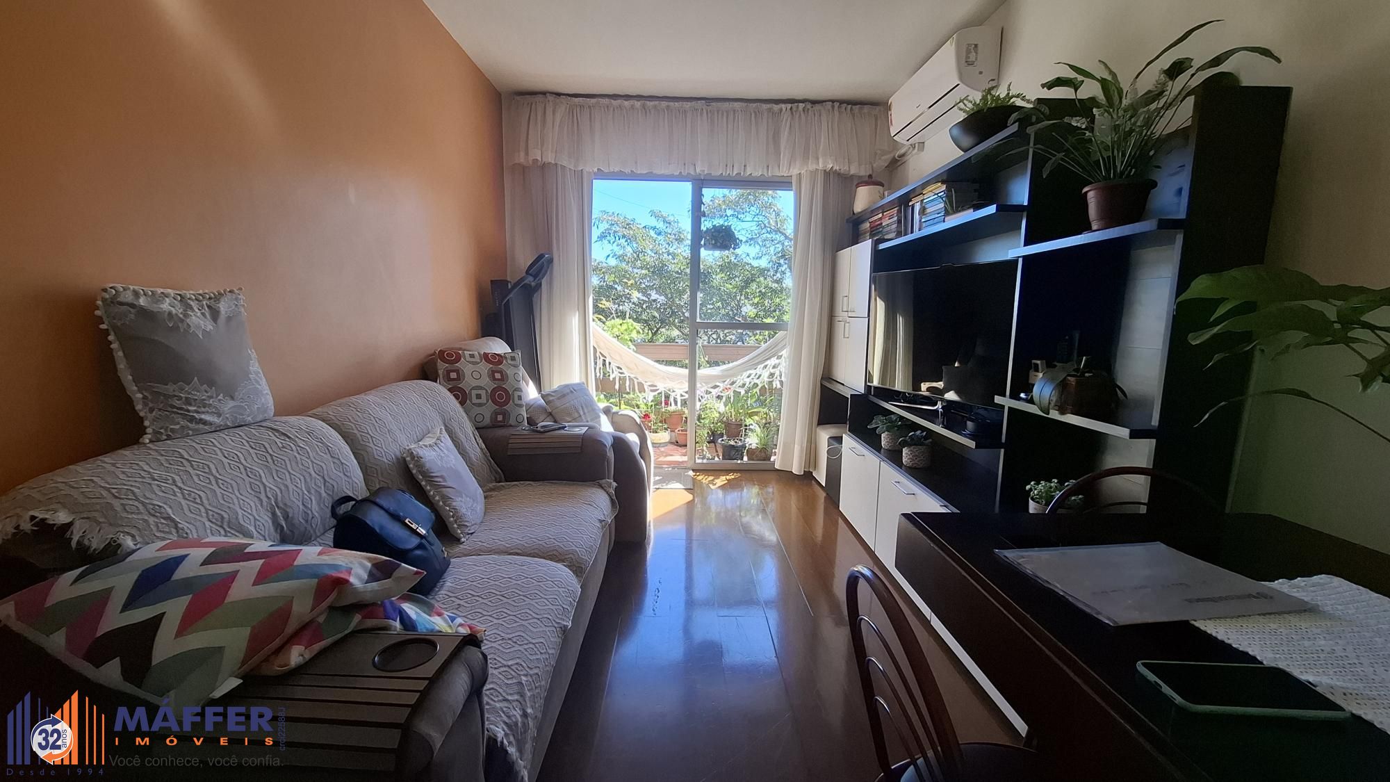 Apartamento 1 dormitório sala 2 ambientes garagem fechada ensolarado com vista