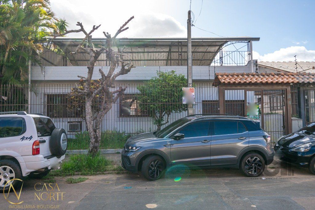Casa à venda com 2 quartos, 350m², 1 suíte, 2 vagas, Rua Dom Jaime de Barros Câmara no bairro Sarandi em Porto Alegre