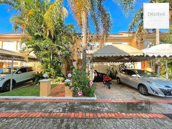 Casa Condominio em Porto Alegre, no bairro Tristeza, com 3 dormitório(s), e 3 banheiros, à venda. — foto 2